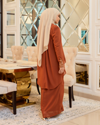 EVELYN KURUNG IN BURNT ORANGE