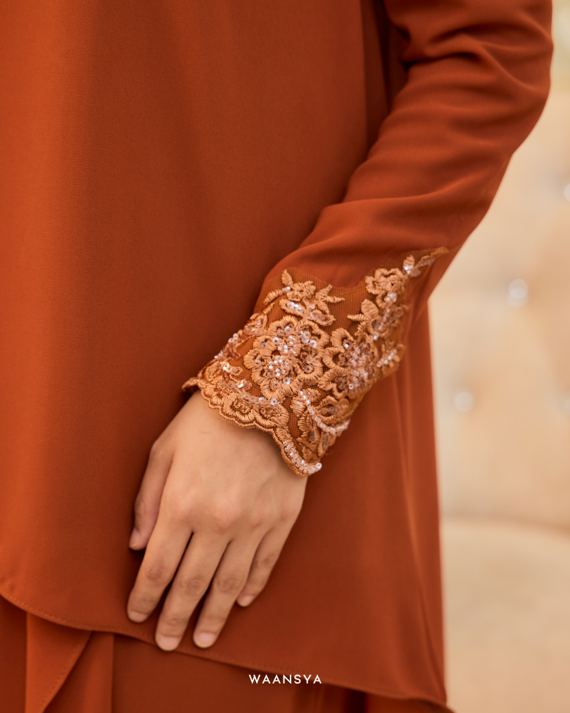 EVELYN KURUNG IN BURNT ORANGE